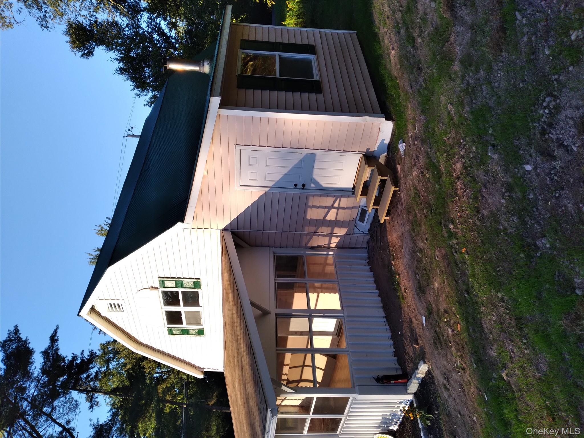 31 Willowemoc Road Livingston Manor, NY 12758 - Photo 4 of 23 a view of a house with a yard