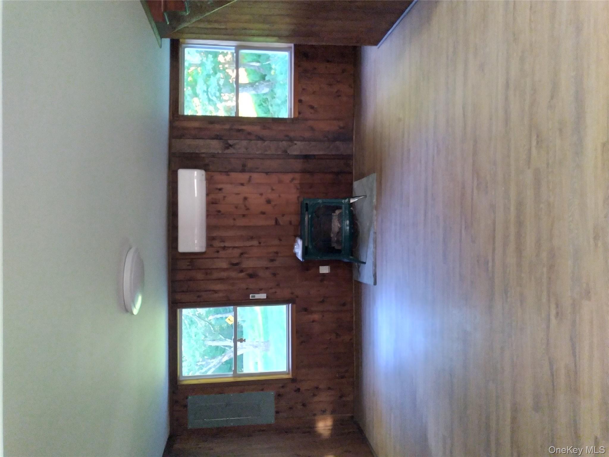 31 Willowemoc Road Livingston Manor, NY 12758 - Photo 8 of 23 a living room with furniture and a flat screen tv