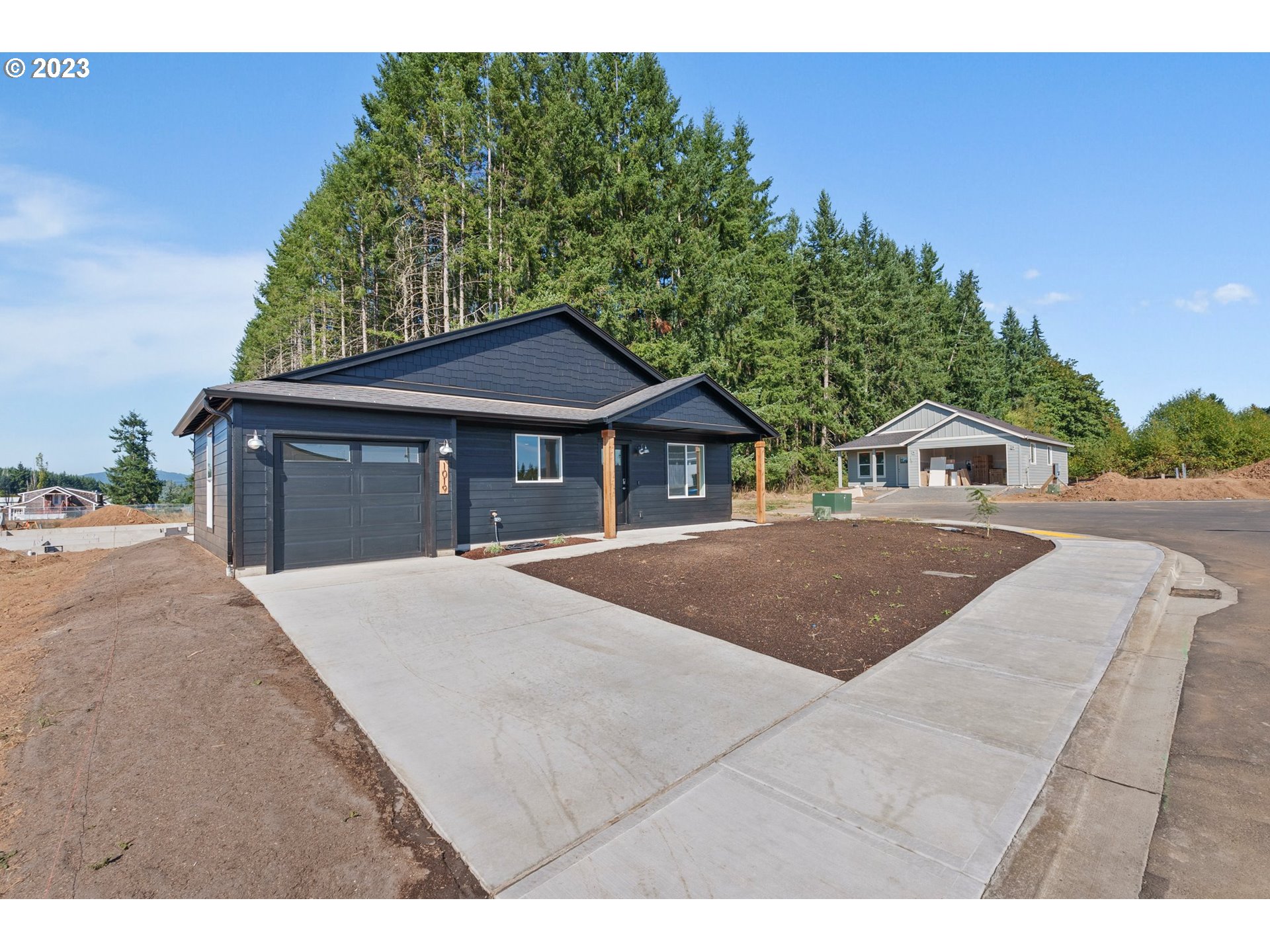 1019 Peach Road Winlock, WA 98596 - Photo 2 of 22 a house with yard in front of it