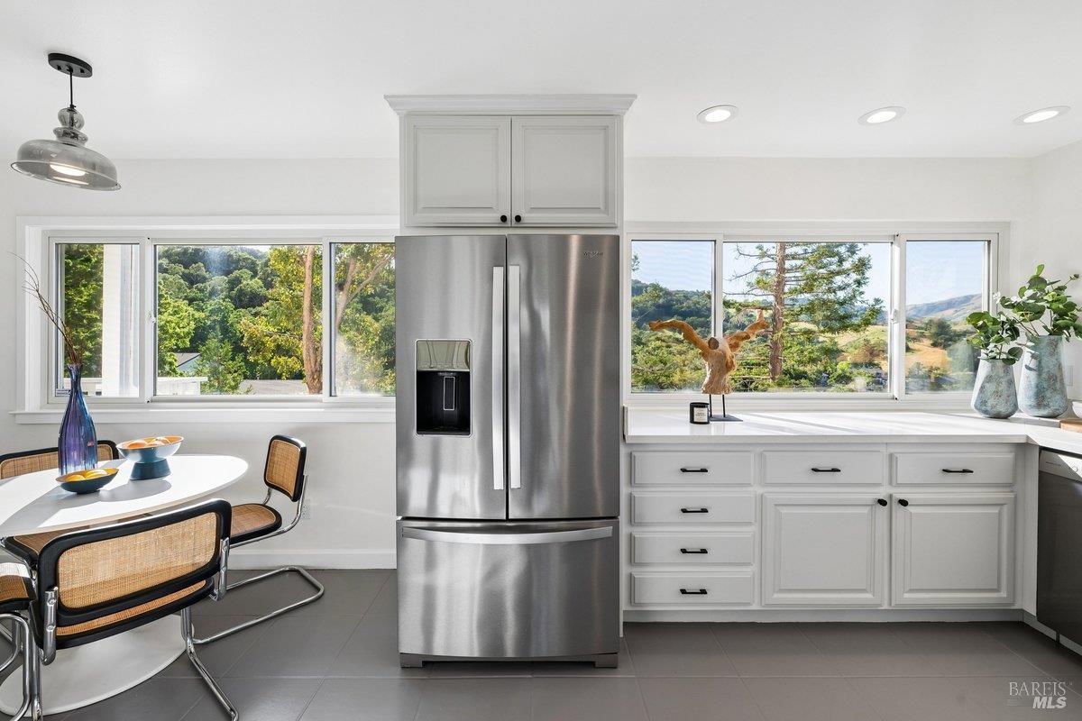 1036 Lea Drive San Rafael, CA 94903 - Photo 14 of 88 a kitchen with stainless steel appliances granite countertop a refrigerator and a stove top oven