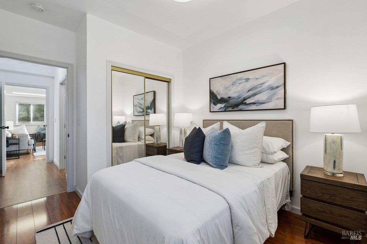 1036 Lea Drive San Rafael, CA 94903 - Photo 63 of 88 a bedroom with a bed and a painting on the wall