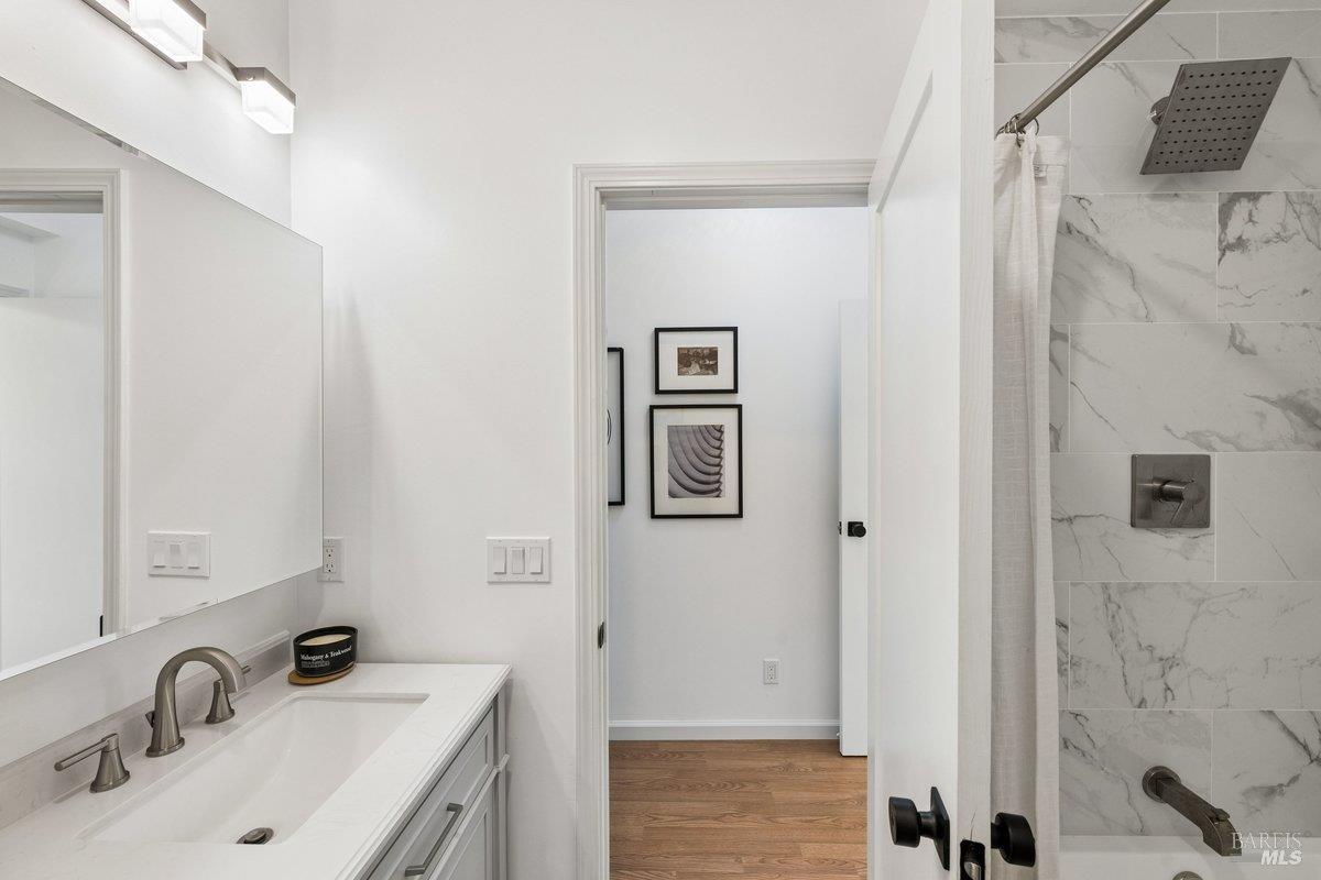 1036 Lea Drive San Rafael, CA 94903 - Photo 64 of 88 a bathroom with a sink and a mirror