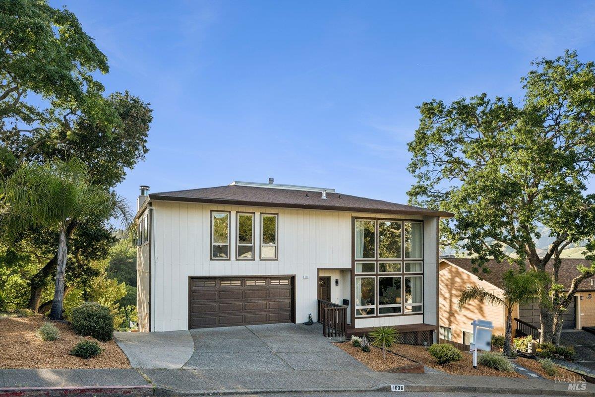 1036 Lea Drive San Rafael, CA 94903 - Photo 82 of 88 a front view of a house with a tree