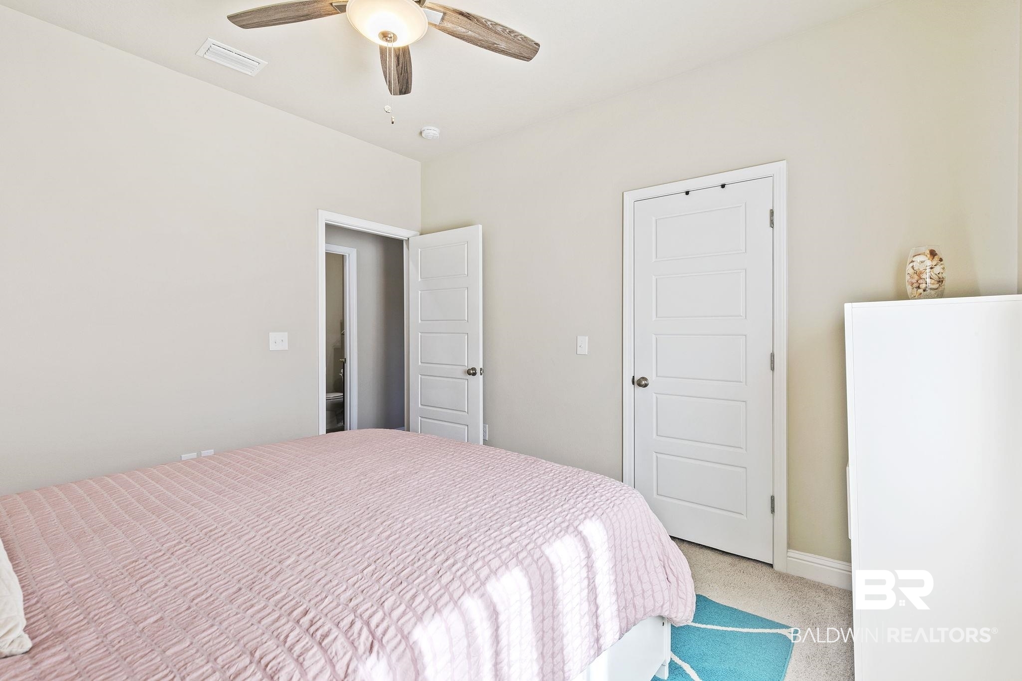 31500 Spoonbill Road Daphne, AL 36527 - Photo 44 of 85 Bedroom with light carpet and ceiling fan