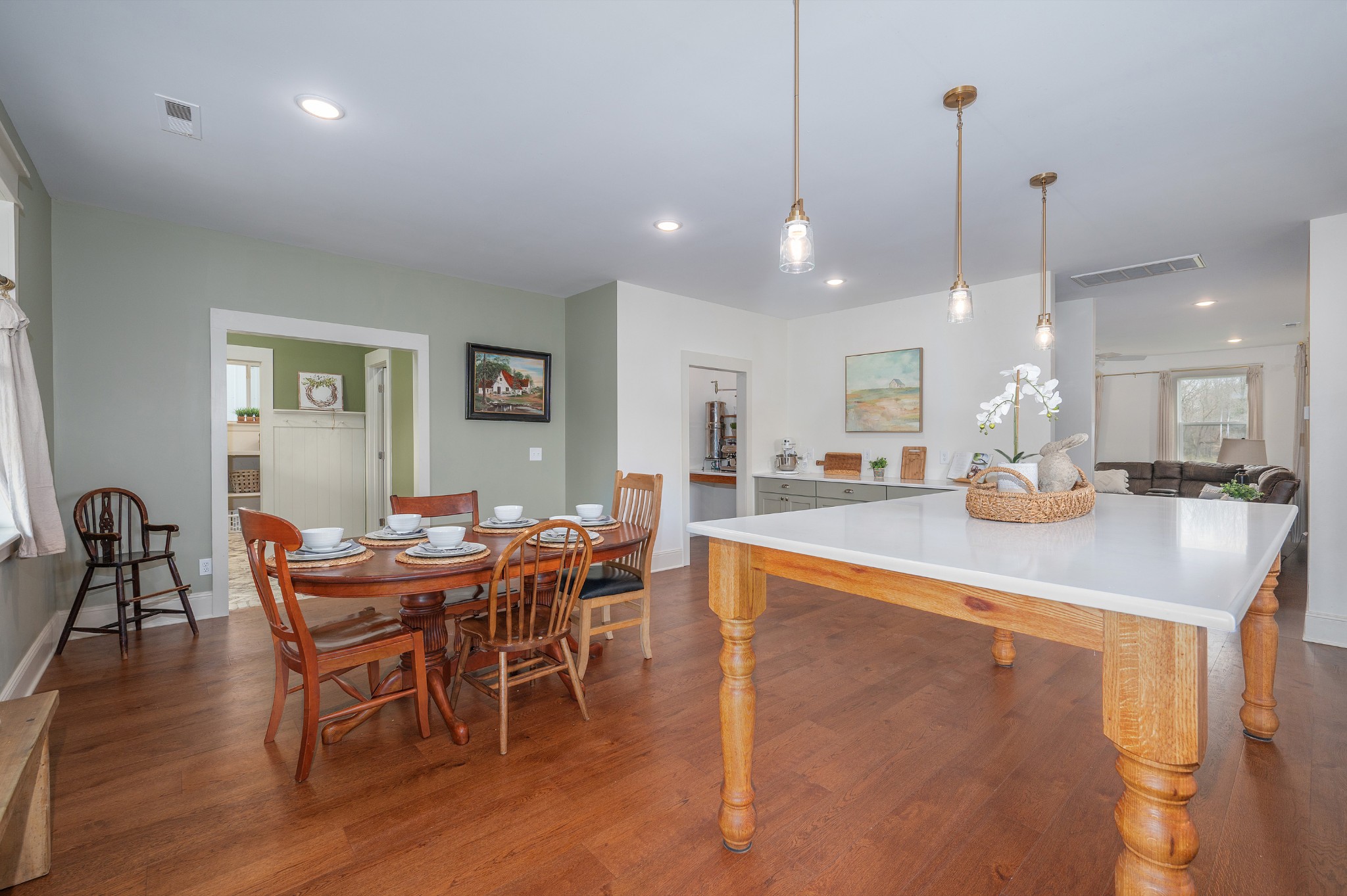 153 Lewis Road Morrison, TN 37357 - Photo 18 of 45 a dining room with stainless steel appliances kitchen island a table and chairs