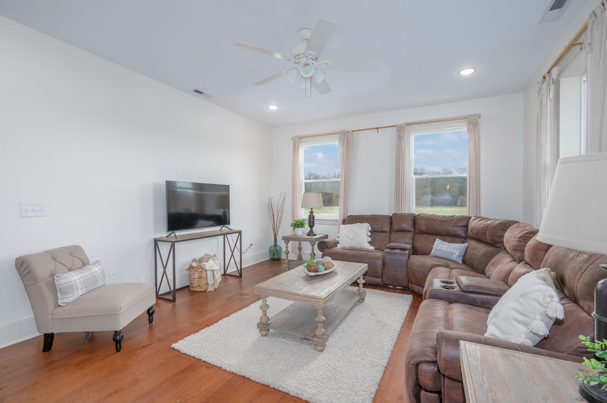 153 Lewis Road Morrison, TN 37357 - Photo 22 of 45 a living room with furniture and a flat screen tv