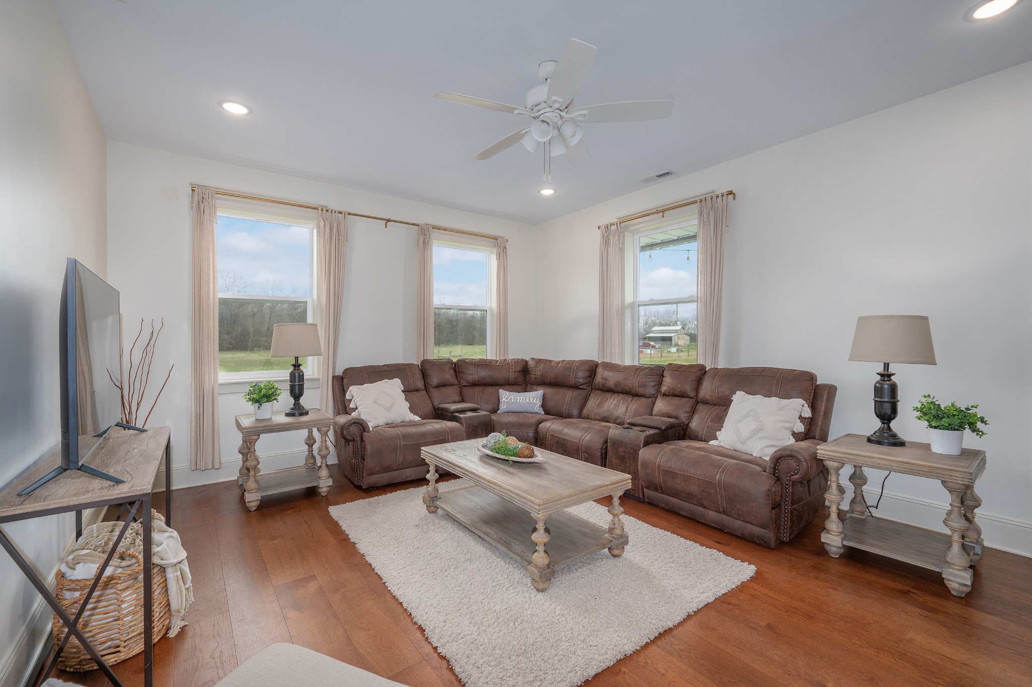 153 Lewis Road Morrison, TN 37357 - Photo 23 of 45 a living room with furniture and a flat screen tv