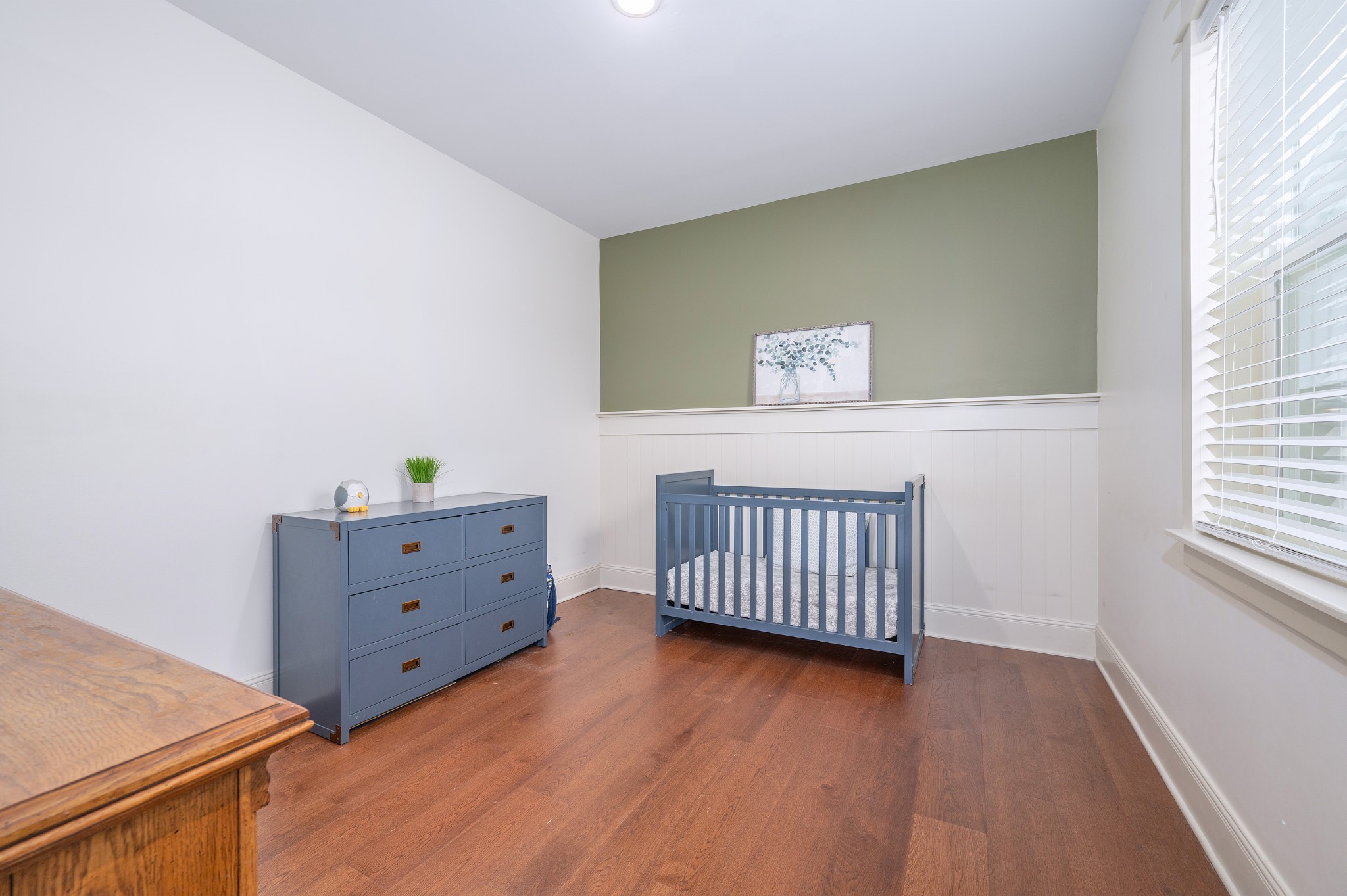 153 Lewis Road Morrison, TN 37357 - Photo 27 of 45 a bedroom with a baby bed baby crib and a dresser