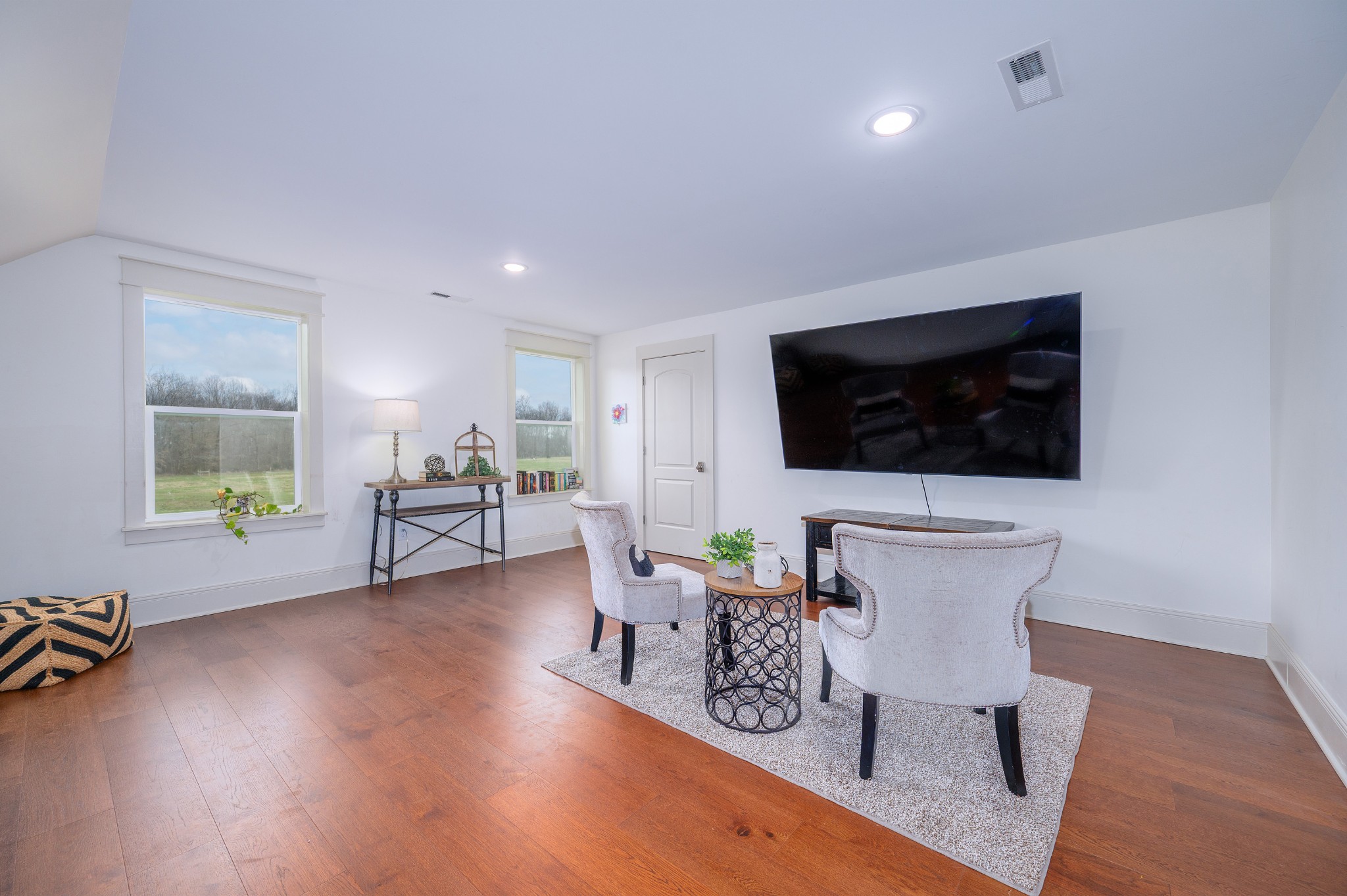 153 Lewis Road Morrison, TN 37357 - Photo 28 of 45 a living room with furniture and a flat screen tv