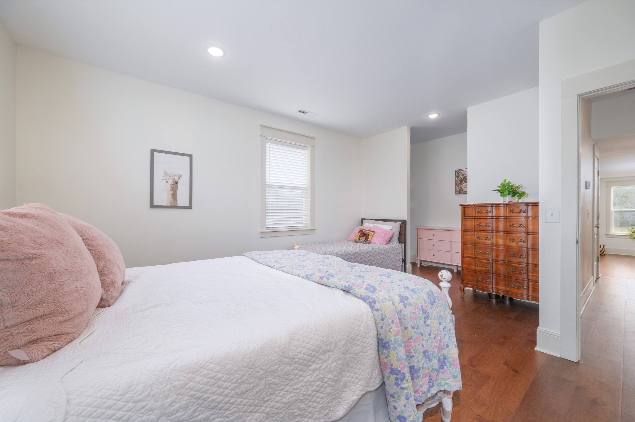 153 Lewis Road Morrison, TN 37357 - Photo 32 of 45 a bedroom with a bed and wooden floor