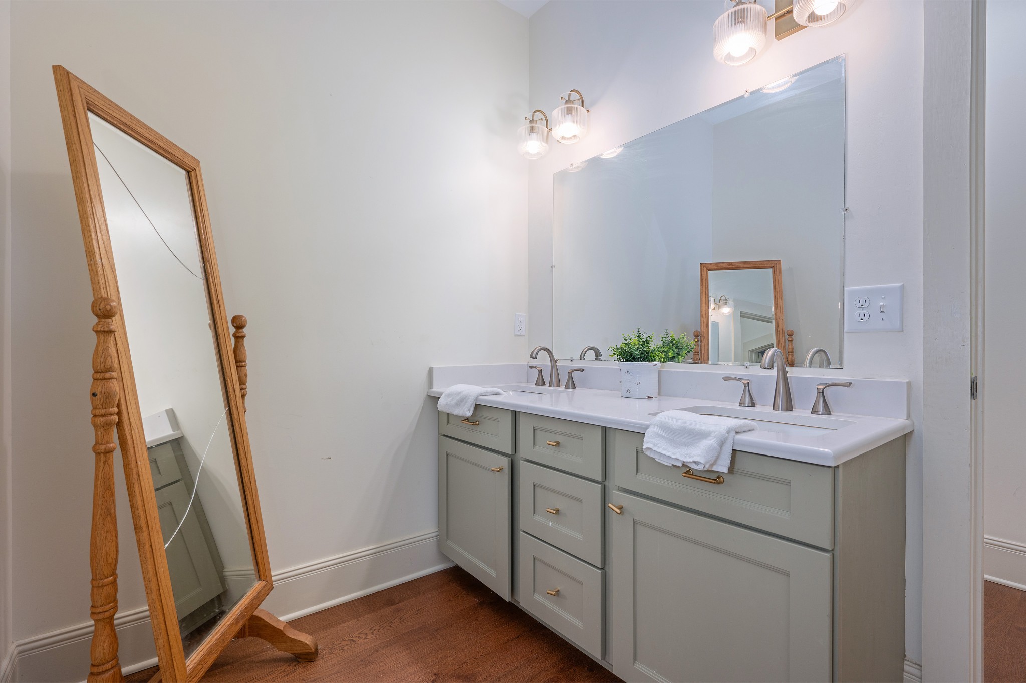 153 Lewis Road Morrison, TN 37357 - Photo 36 of 45 a bathroom with a double vanity sink and mirror