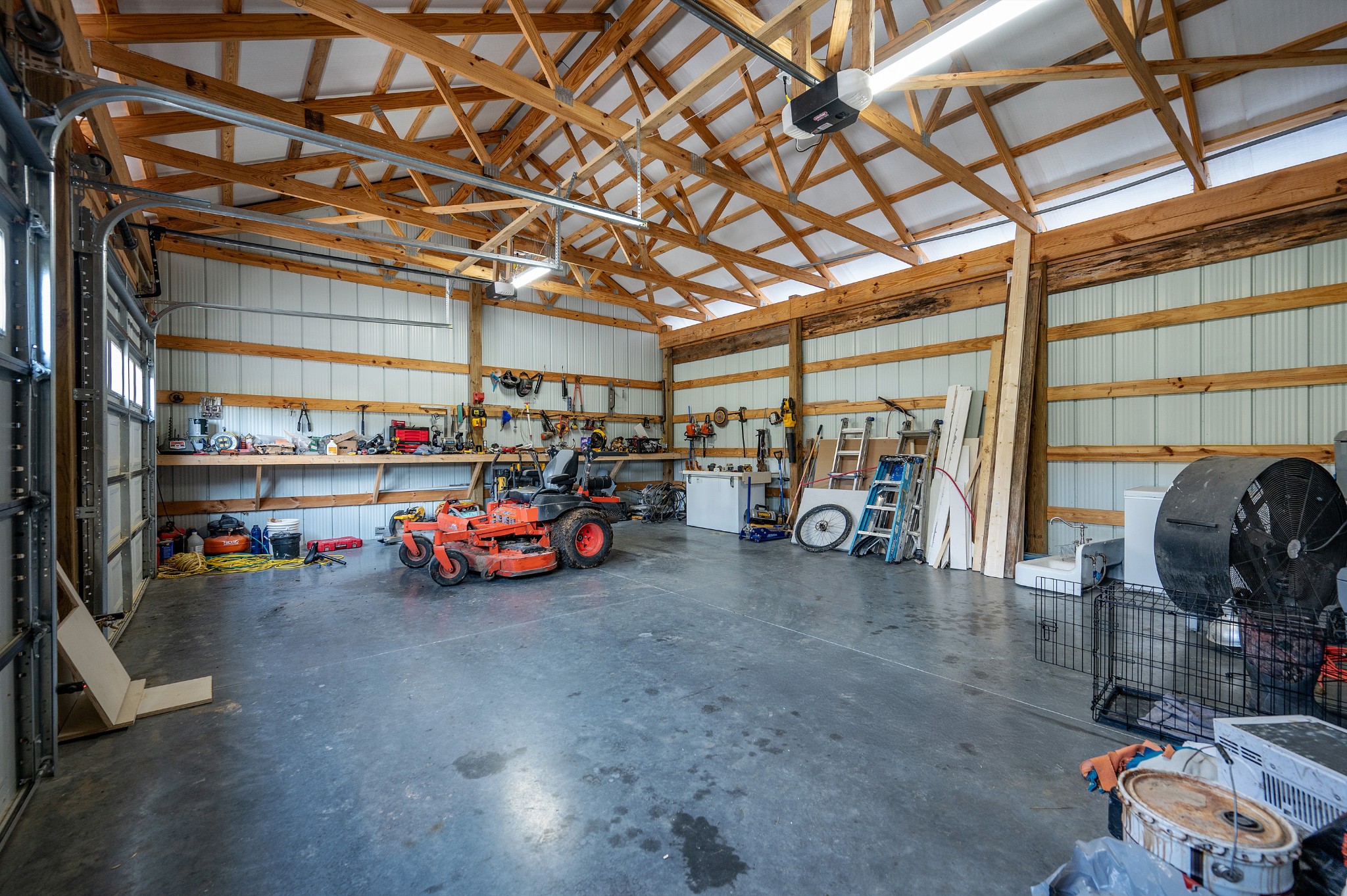 153 Lewis Road Morrison, TN 37357 - Photo 38 of 45 a view of a garage with parked cars