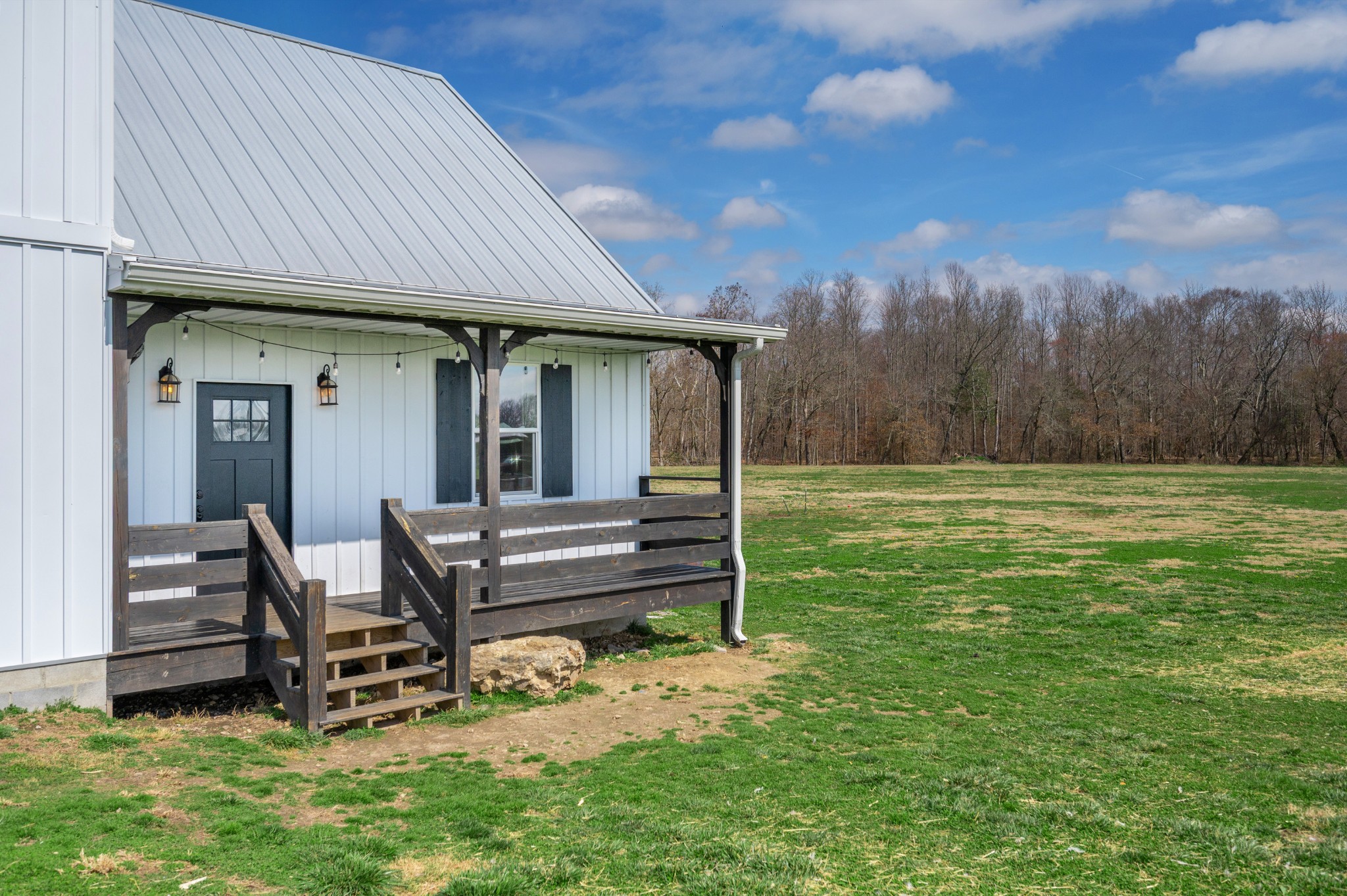 153 Lewis Road Morrison, TN 37357 - Photo 4 of 45 a view of a chair and table in backyard of the house