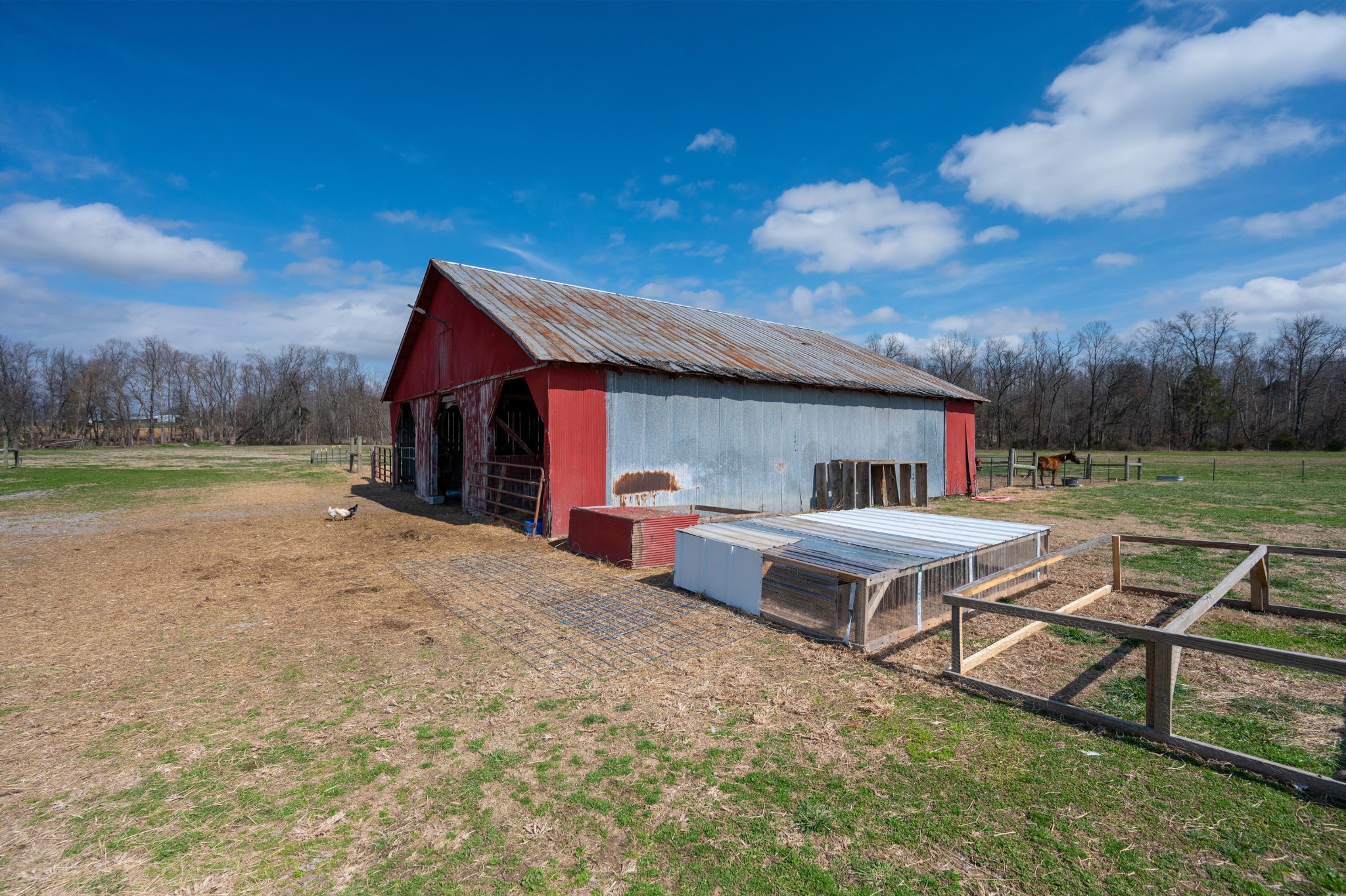 153 Lewis Road Morrison, TN 37357 - Photo 42 of 45 a view of a house with backyard and sitting area