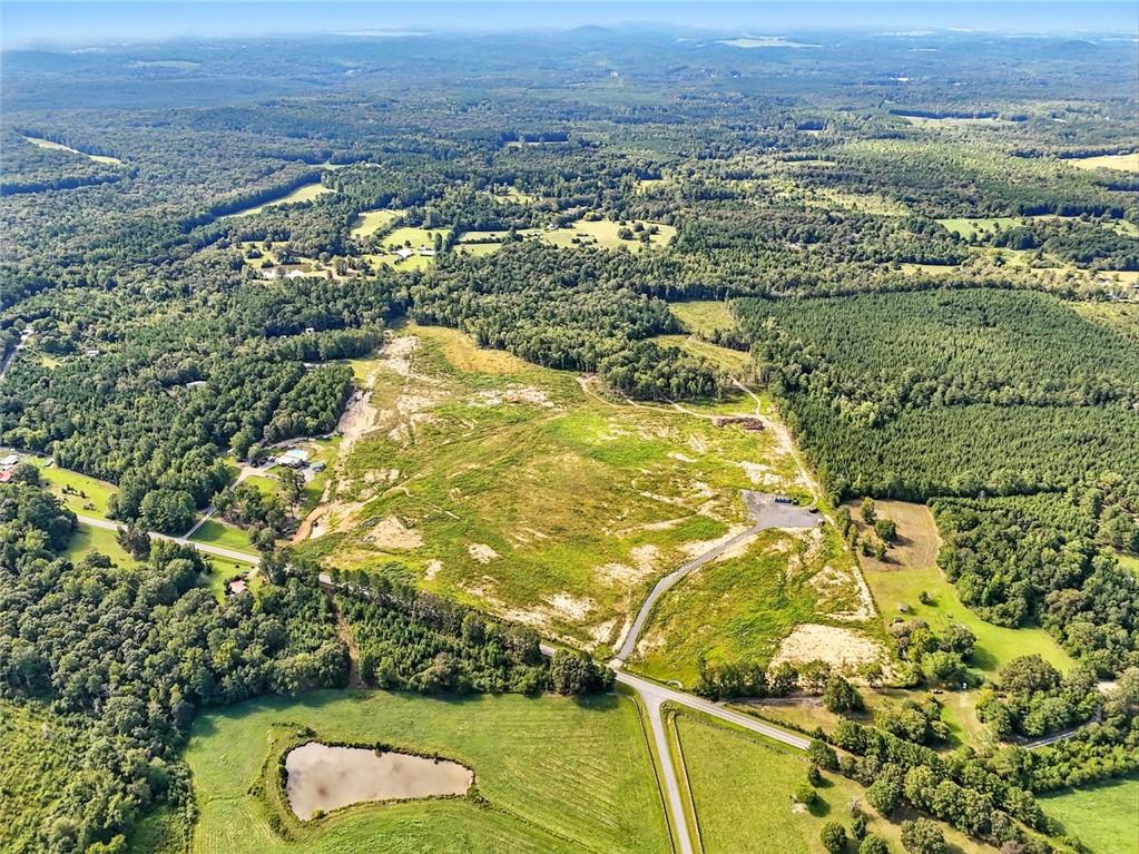 851 Barnsley Garden Road Adairsville, GA 30103 - Photo 2 of 17 an aerial view of residential houses with outdoor space