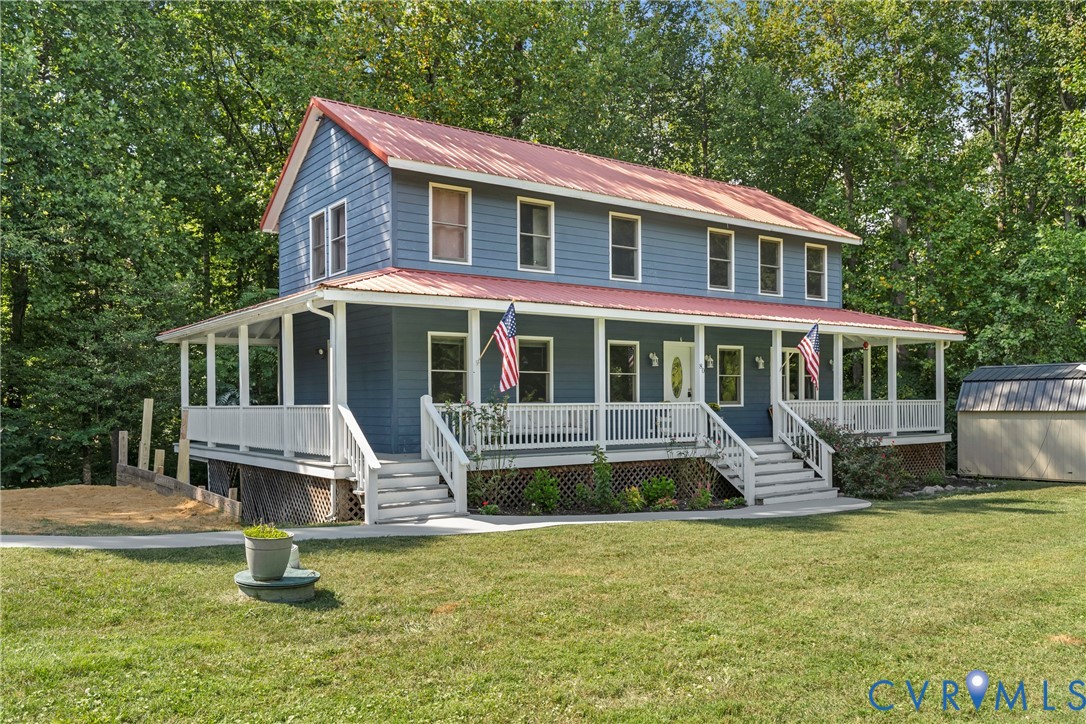 80 Mill Ridge Road Hartfield, VA 23071 - Photo 37 of 43 Two-story residence featuring a red metal roof, bl
