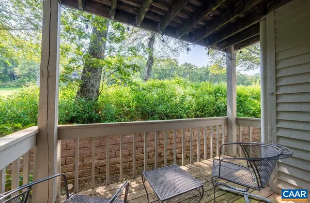 a blue chair sitting in front of a building