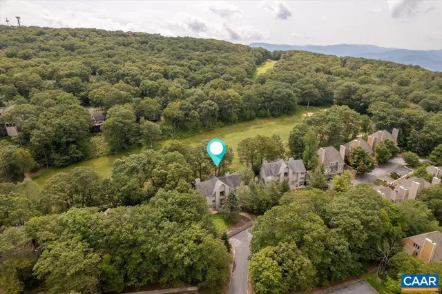 a view of lake and mountain