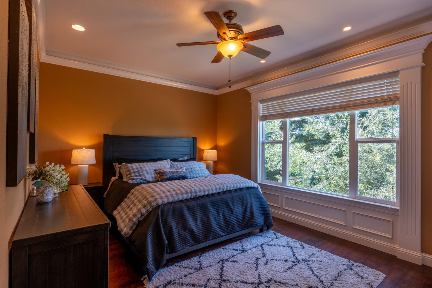 3388 Sudbury Road Cameron Park, CA 95682 - Photo 13 of 47 a bedroom with a bed and a chandelier