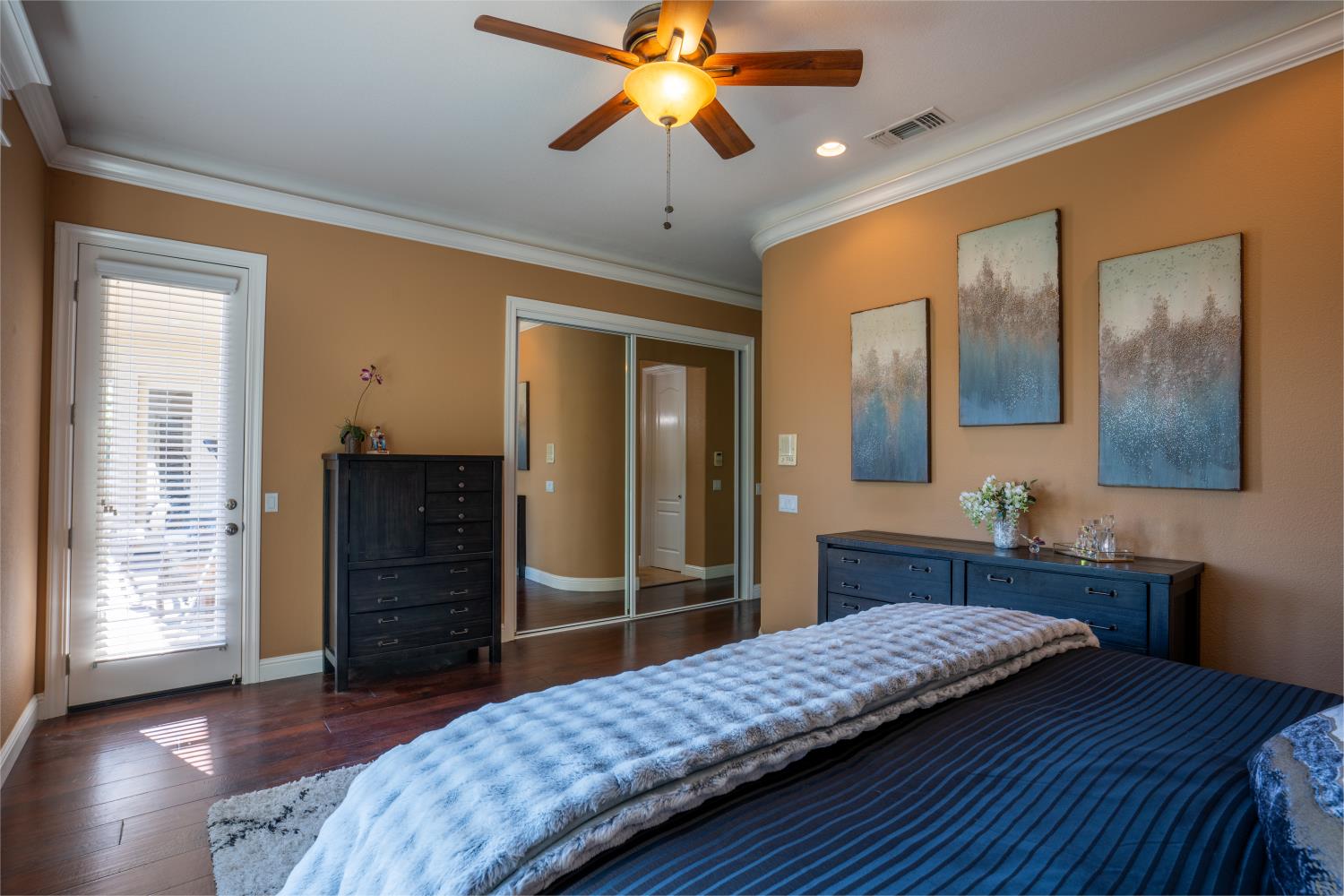 3388 Sudbury Road Cameron Park, CA 95682 - Photo 14 of 47 a bedroom with a bed and a chandelier