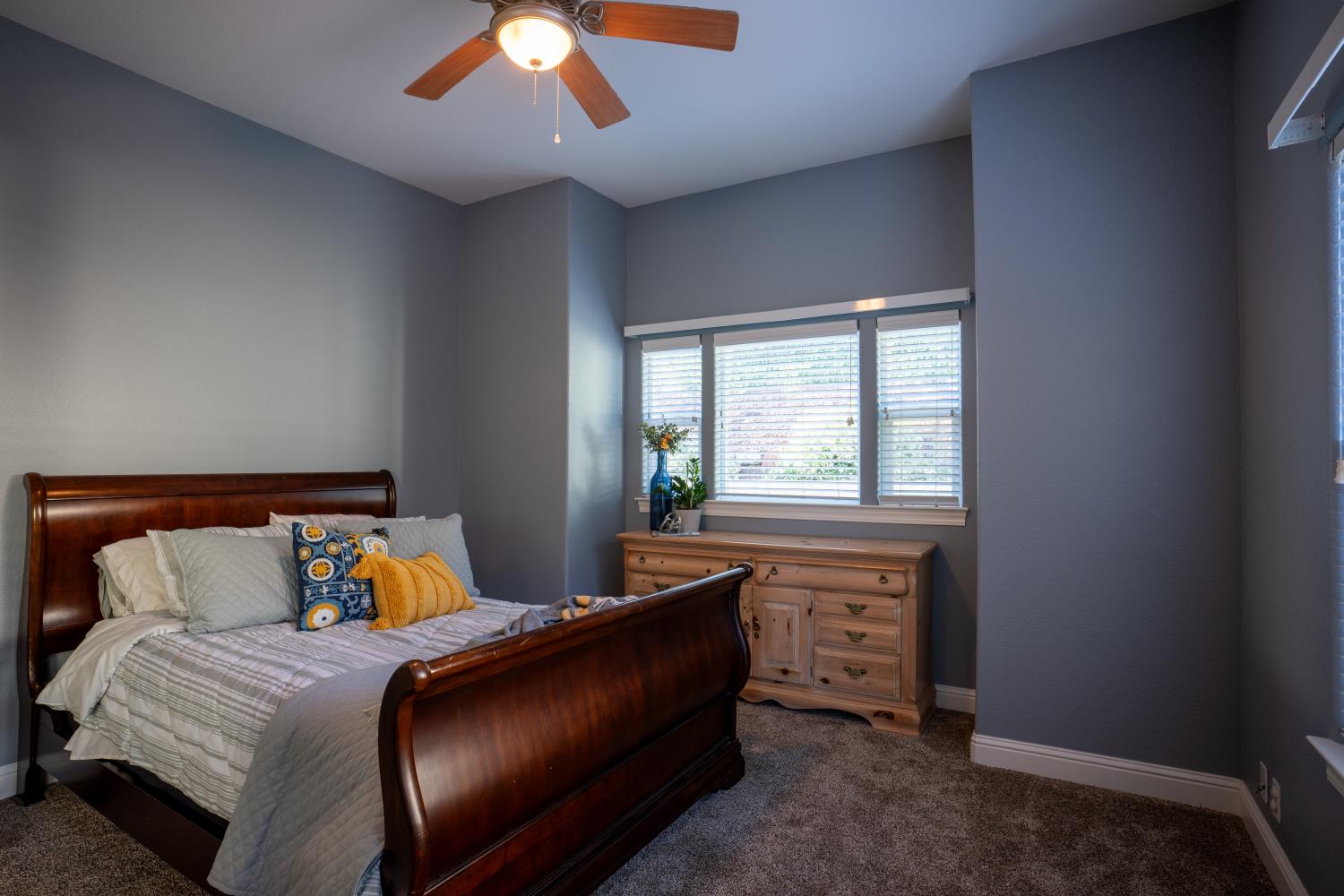 3388 Sudbury Road Cameron Park, CA 95682 - Photo 16 of 47 a bedroom with a bed and a window