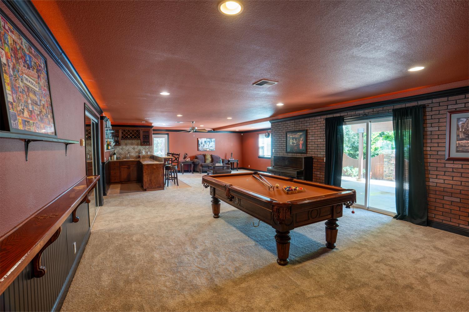 3388 Sudbury Road Cameron Park, CA 95682 - Photo 26 of 47 a room with furniture and a flat screen tv