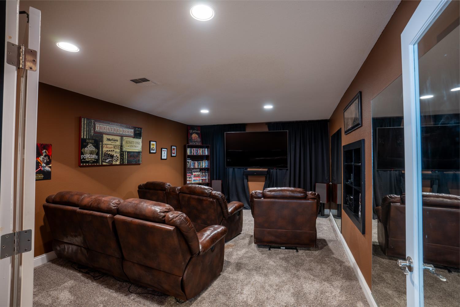 3388 Sudbury Road Cameron Park, CA 95682 - Photo 28 of 47 a living room with furniture and a flat screen tv