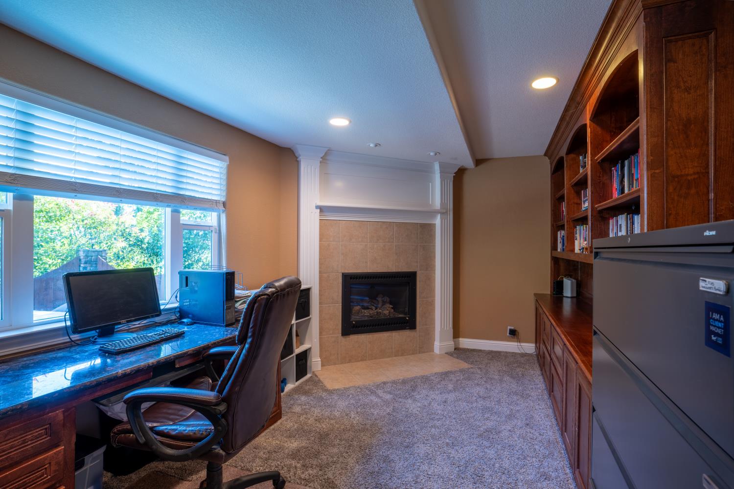 3388 Sudbury Road Cameron Park, CA 95682 - Photo 31 of 47 a room with furniture bookshelf and a window