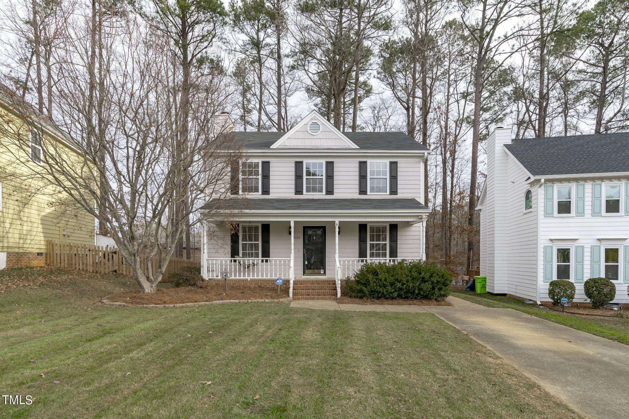 4624 Timberhurst Drive Raleigh, NC 27612 - Photo 1 of 29 a front view of a house with a garden
