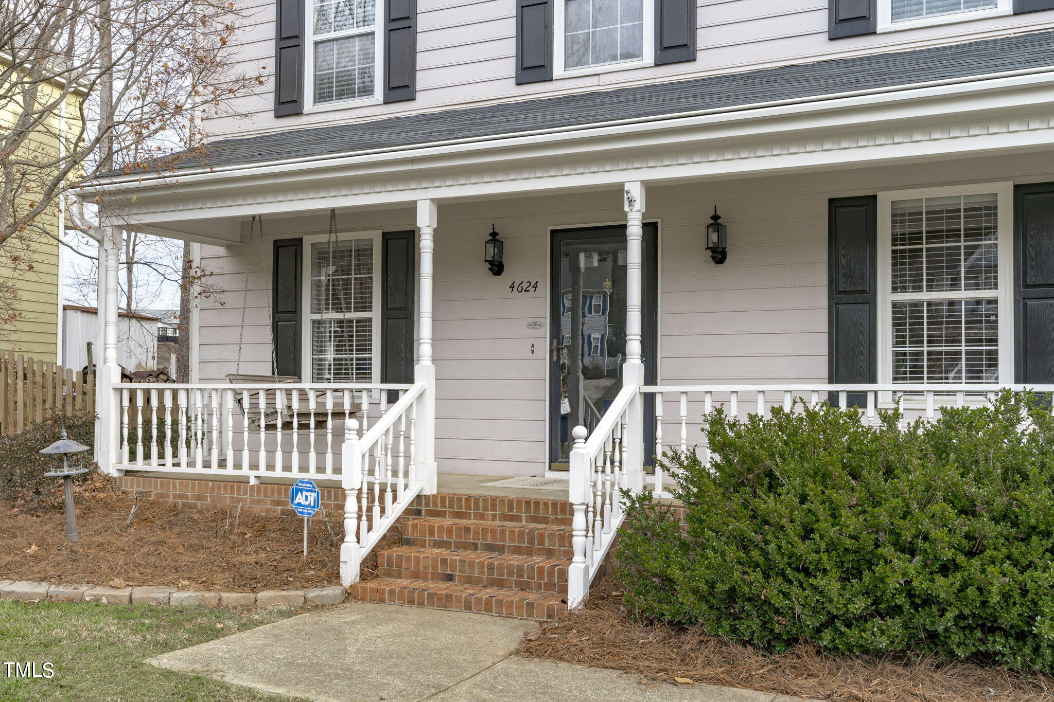 4624 Timberhurst Drive Raleigh, NC 27612 - Photo 3 of 29 a view of a house with a window and stairs