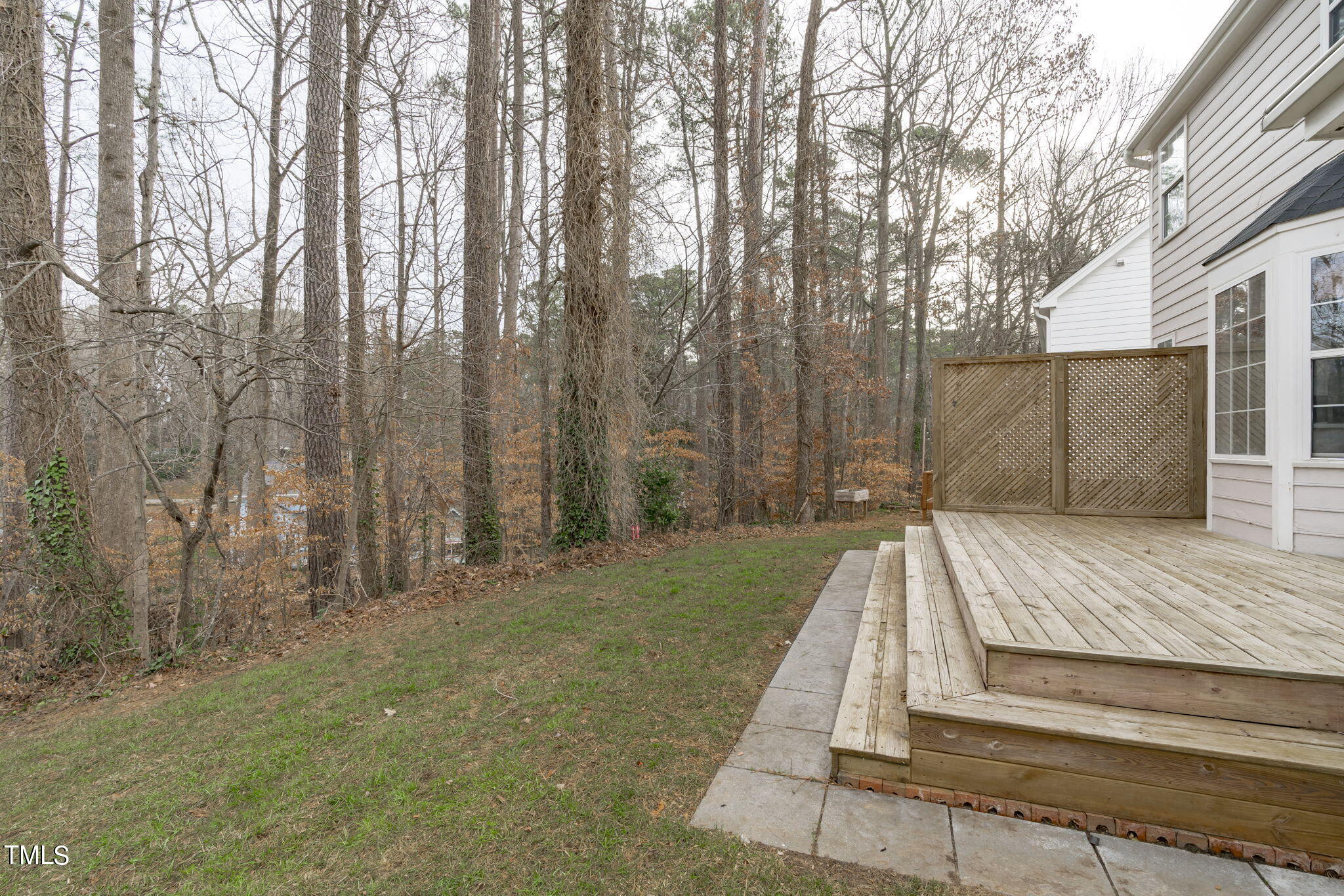 4624 Timberhurst Drive Raleigh, NC 27612 - Photo 5 of 29 a view of backyard with green space