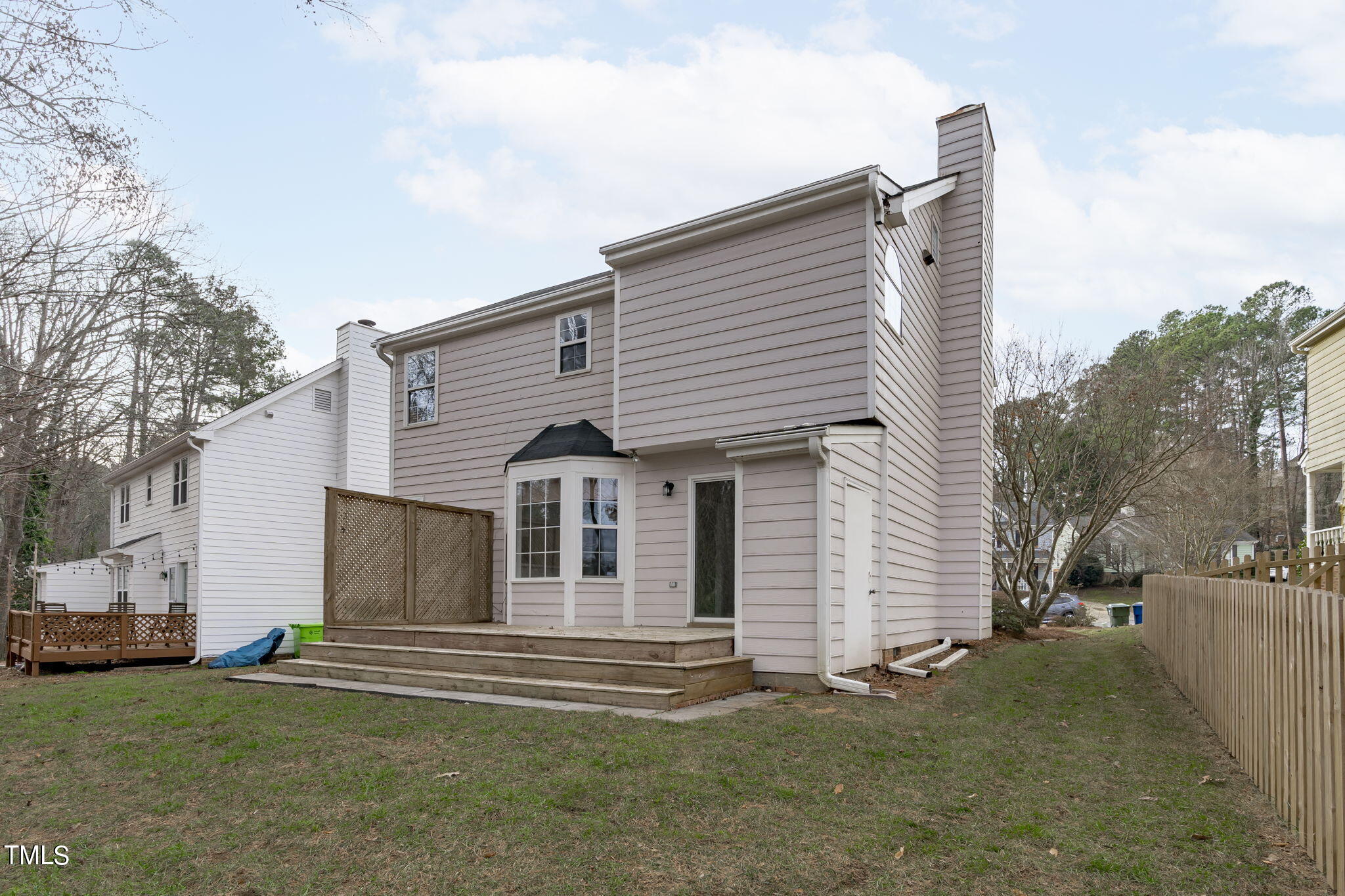 4624 Timberhurst Drive Raleigh, NC 27612 - Photo 6 of 29 a view of a house with a yard