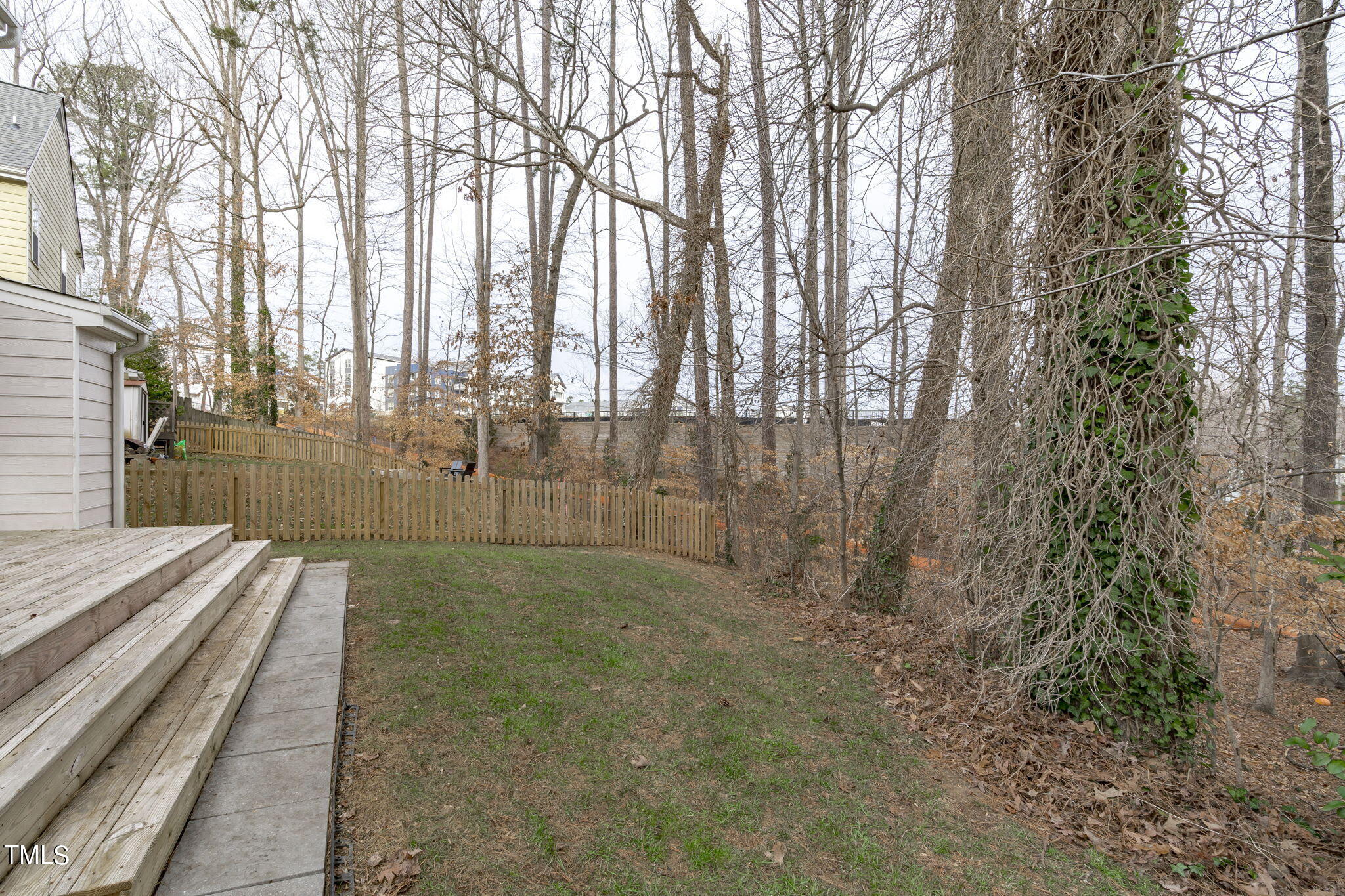 4624 Timberhurst Drive Raleigh, NC 27612 - Photo 7 of 29 a view of a backyard