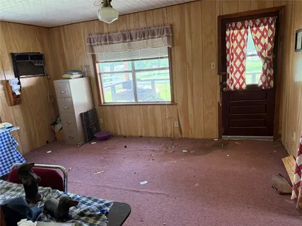 a room with furniture and a window