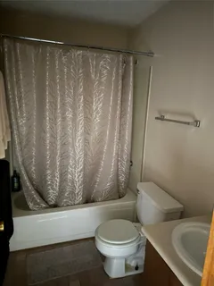 a view of a house with backyard