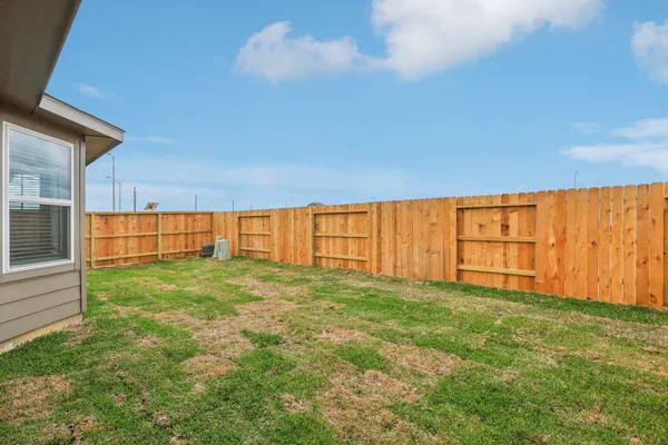 a view of yard with an outdoor space