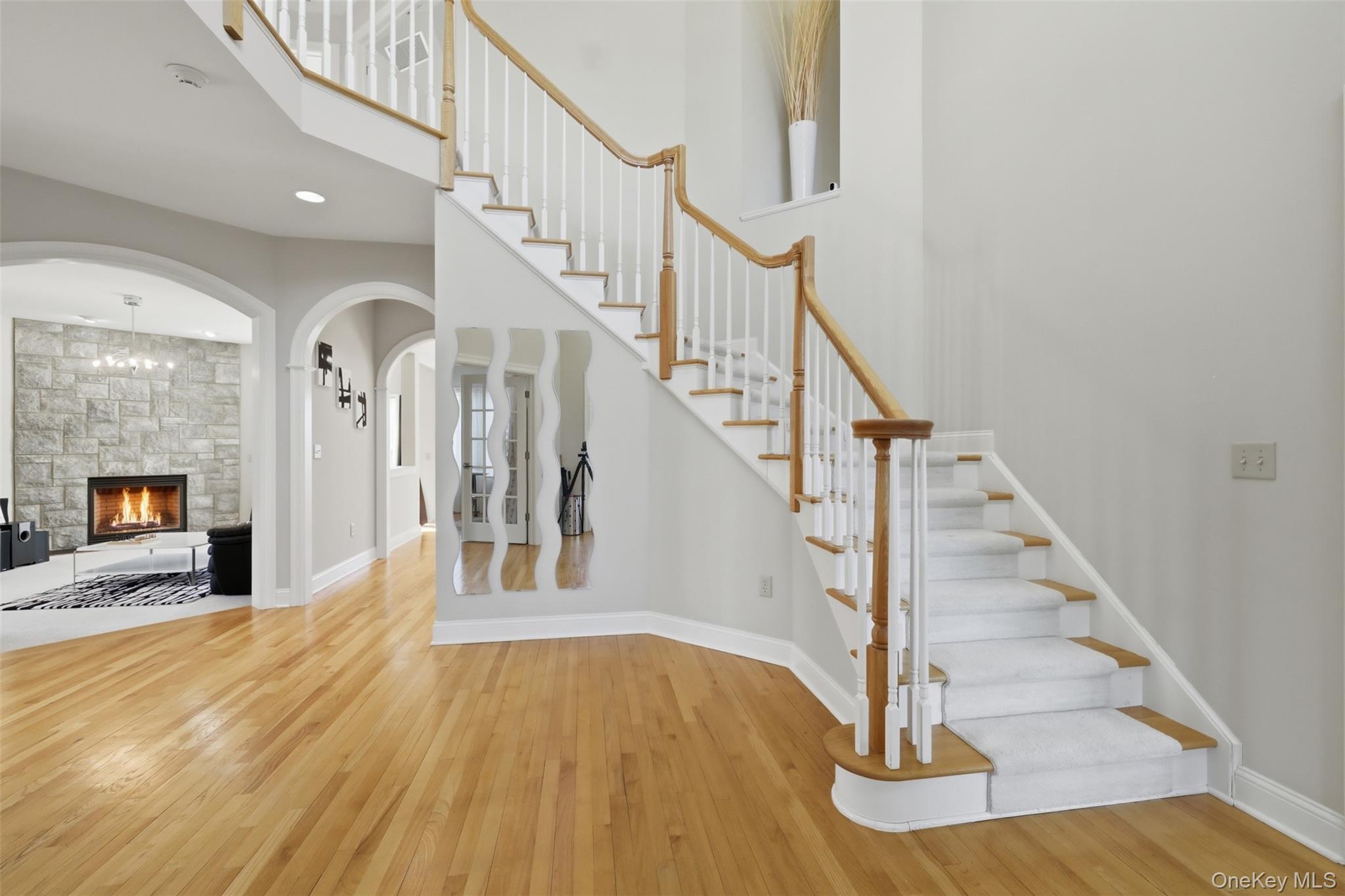 12 Feagles Road Warwick, NY 10990 - Photo 3 of 45 a view of staircase with white walls and a floor to ceiling window