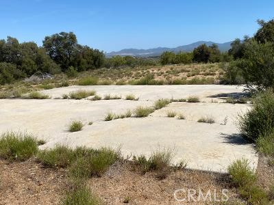 19 Higgins Road Anza, CA 92539 - Photo 4 of 18 a view of a lake with trees in the background