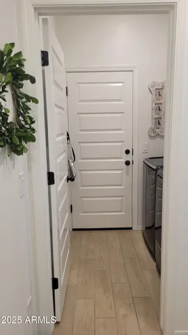 a close view of laundry room with a washer and dryer