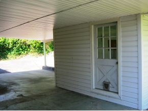 400 Ridgefields Road, Unit 388 Kingsport, TN 37660 - Photo 23 of 24 Fenced back lawn and workshop