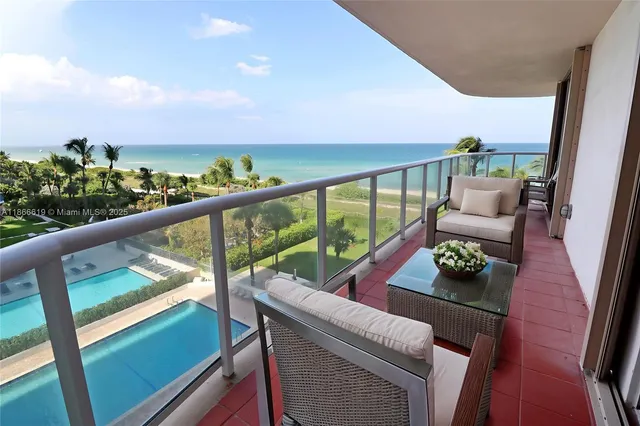 a view of balcony with furniture