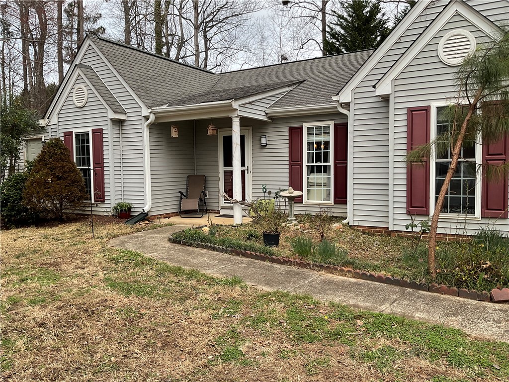229 Cub Cove Drive Walhalla, SC 29691 - Photo 1 of 50 This inviting home features a charming exterior with a covered front entrance and well-maintained landscaping.