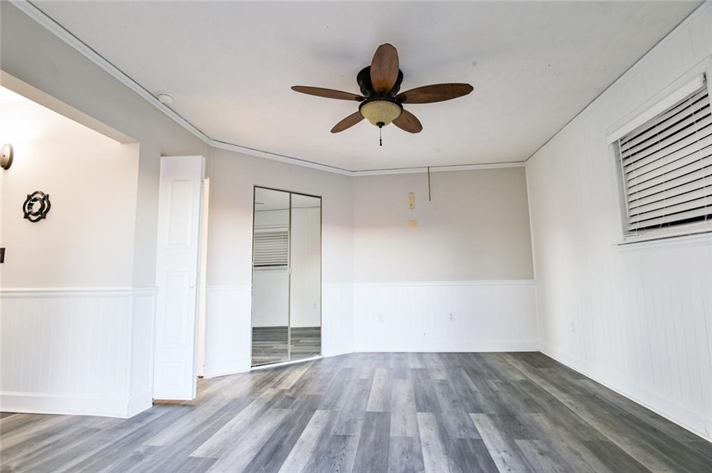 458 Haley Road Jackson, GA 30233 - Photo 21 of 47 a view of empty room with wooden floor and fan