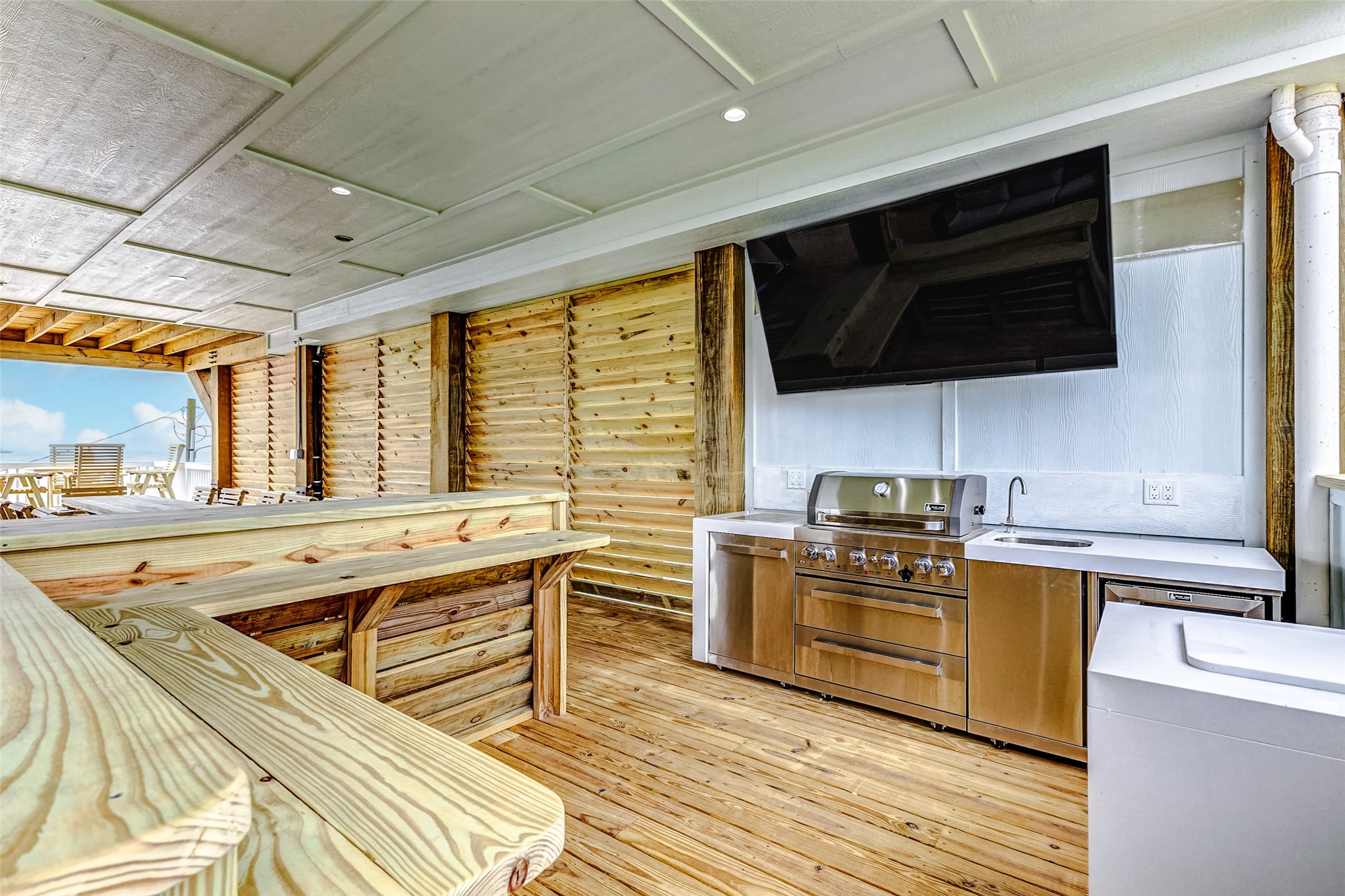 1395 Keith Avenue Port Bolivar, TX 77617 - Photo 11 of 38 a kitchen with stainless steel appliances a stove sink and microwave