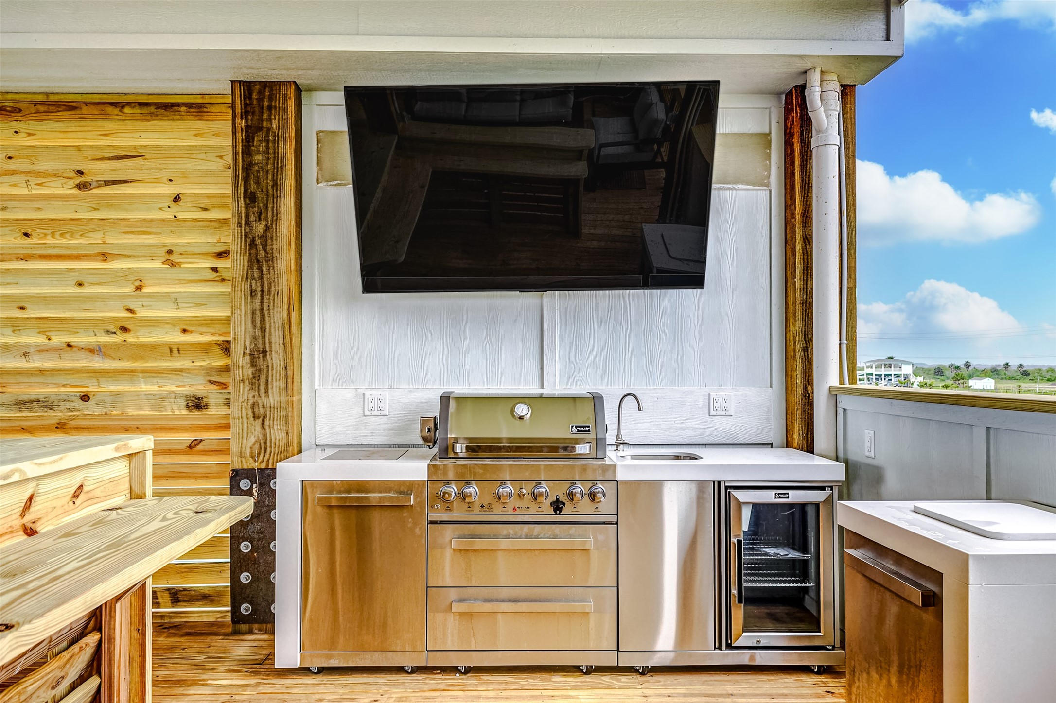 1395 Keith Avenue Port Bolivar, TX 77617 - Photo 12 of 38 a kitchen with a stove and a microwave