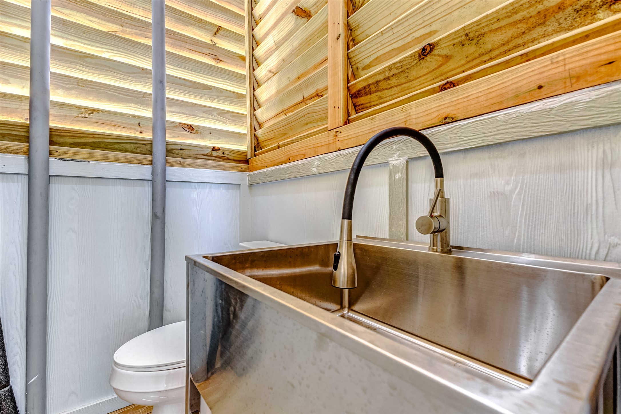 1395 Keith Avenue Port Bolivar, TX 77617 - Photo 13 of 38 a close view of sink and toilet