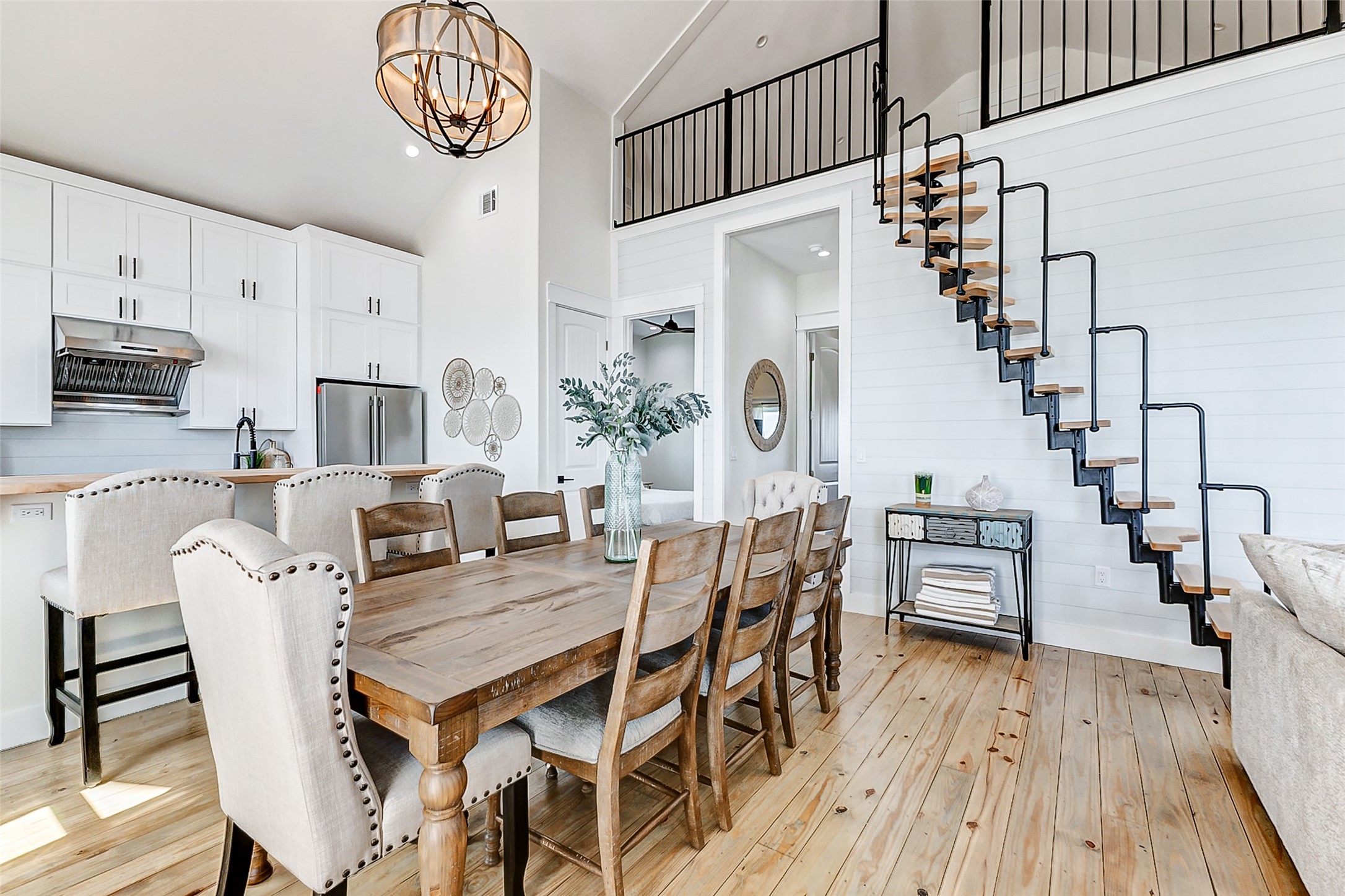 1395 Keith Avenue Port Bolivar, TX 77617 - Photo 14 of 38 a view of a dining room with furniture and wooden floor