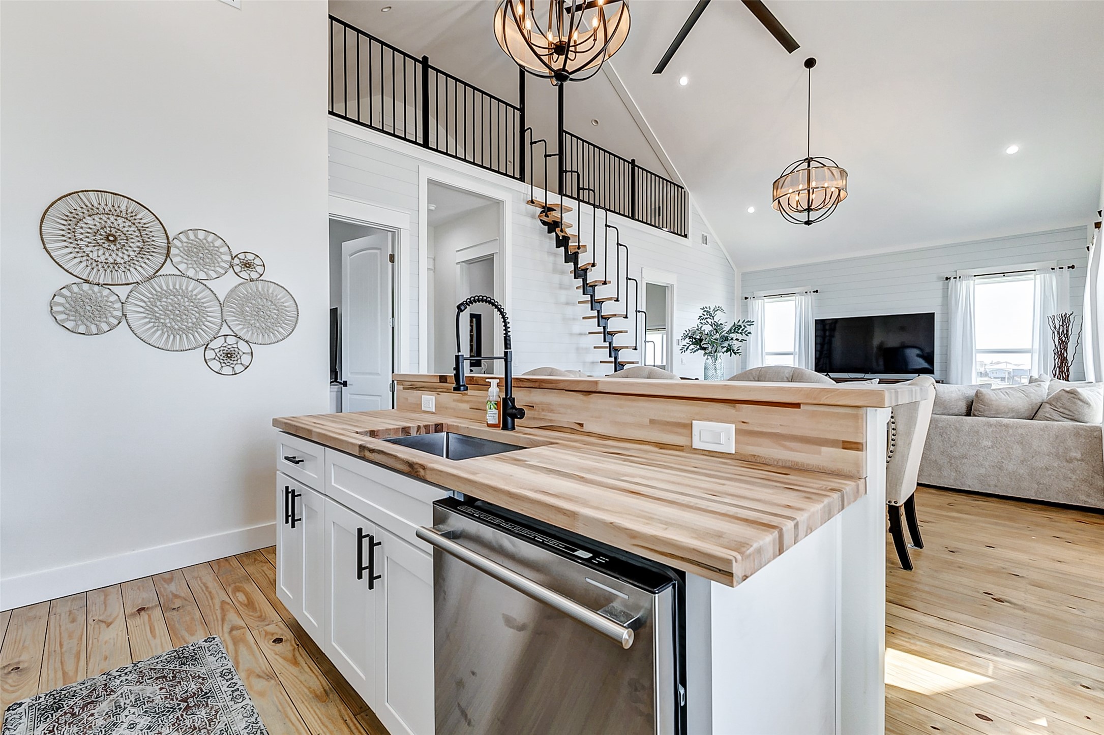 1395 Keith Avenue Port Bolivar, TX 77617 - Photo 19 of 38 a kitchen with a stove and a clock