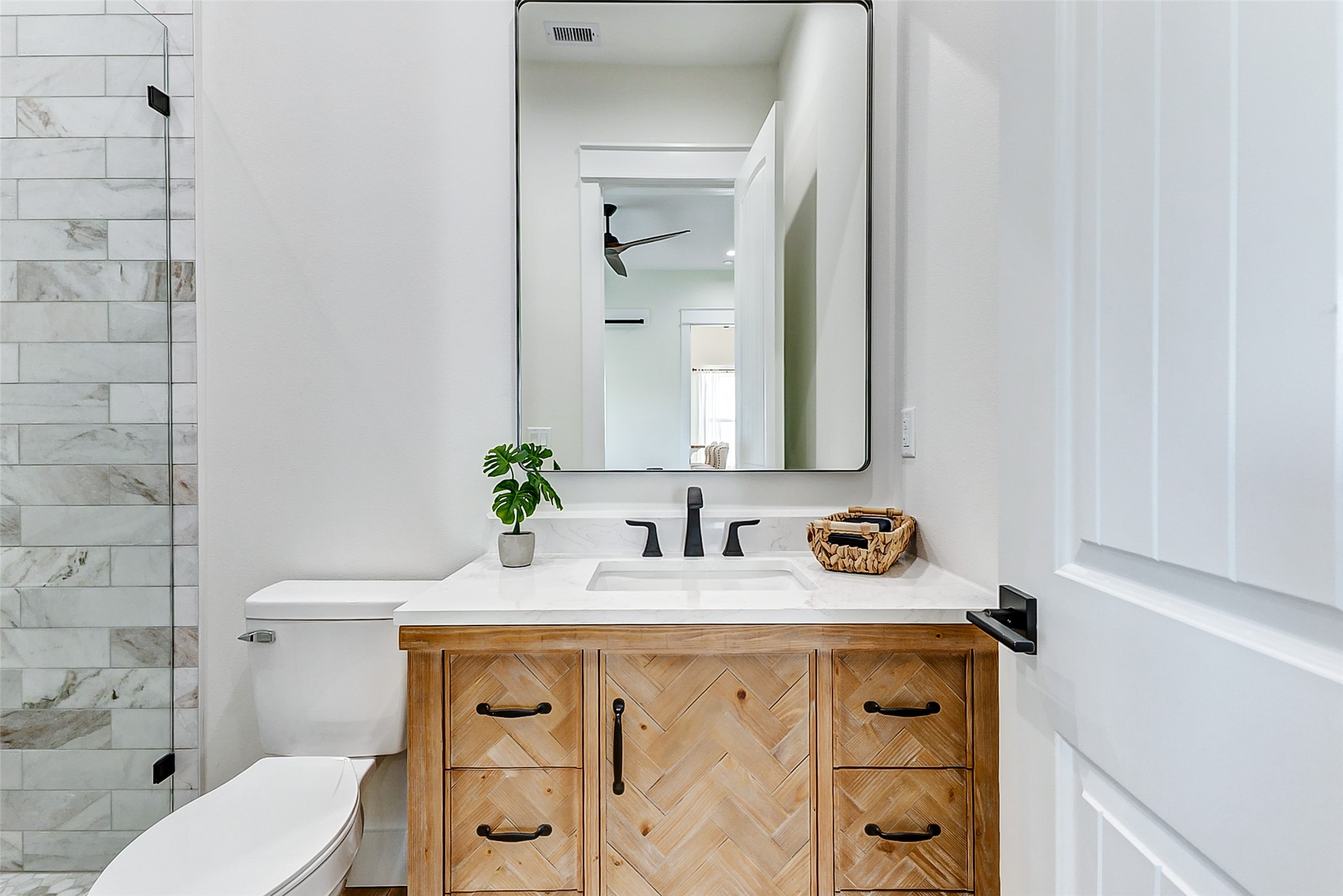 1395 Keith Avenue Port Bolivar, TX 77617 - Photo 29 of 38 a bathroom with a sink and a toilet