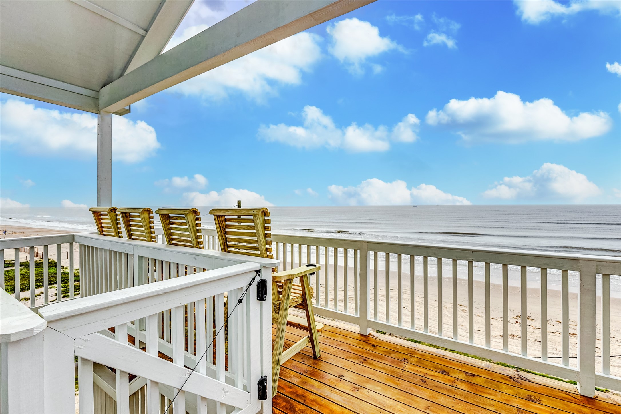 1395 Keith Avenue Port Bolivar, TX 77617 - Photo 5 of 38 a view of roof deck with wooden fence